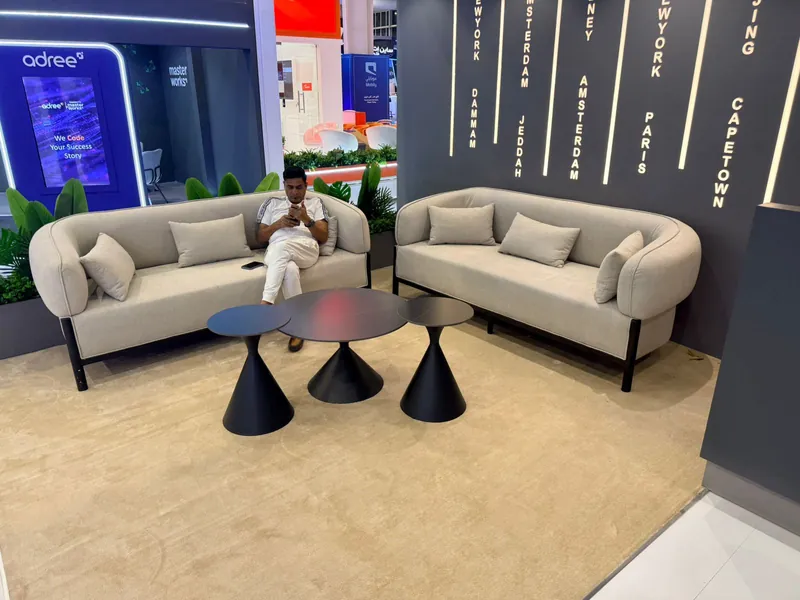 FlyAkeed lounge with city names wall